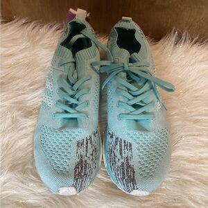 Blue Adidas running shoes